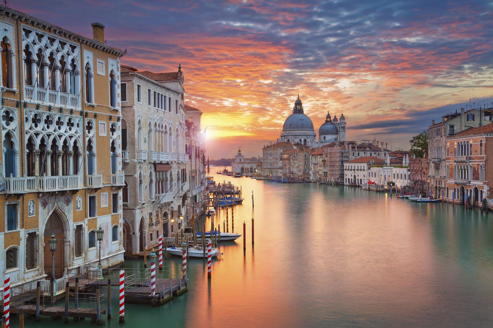 Image of Grand Canal in Venice, with Santa Maria della Salute Basilica in the background.