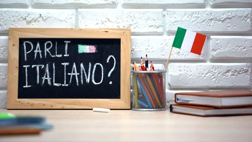 Fala italiano escrito a bordo, bandeira internacional na caixa, língua