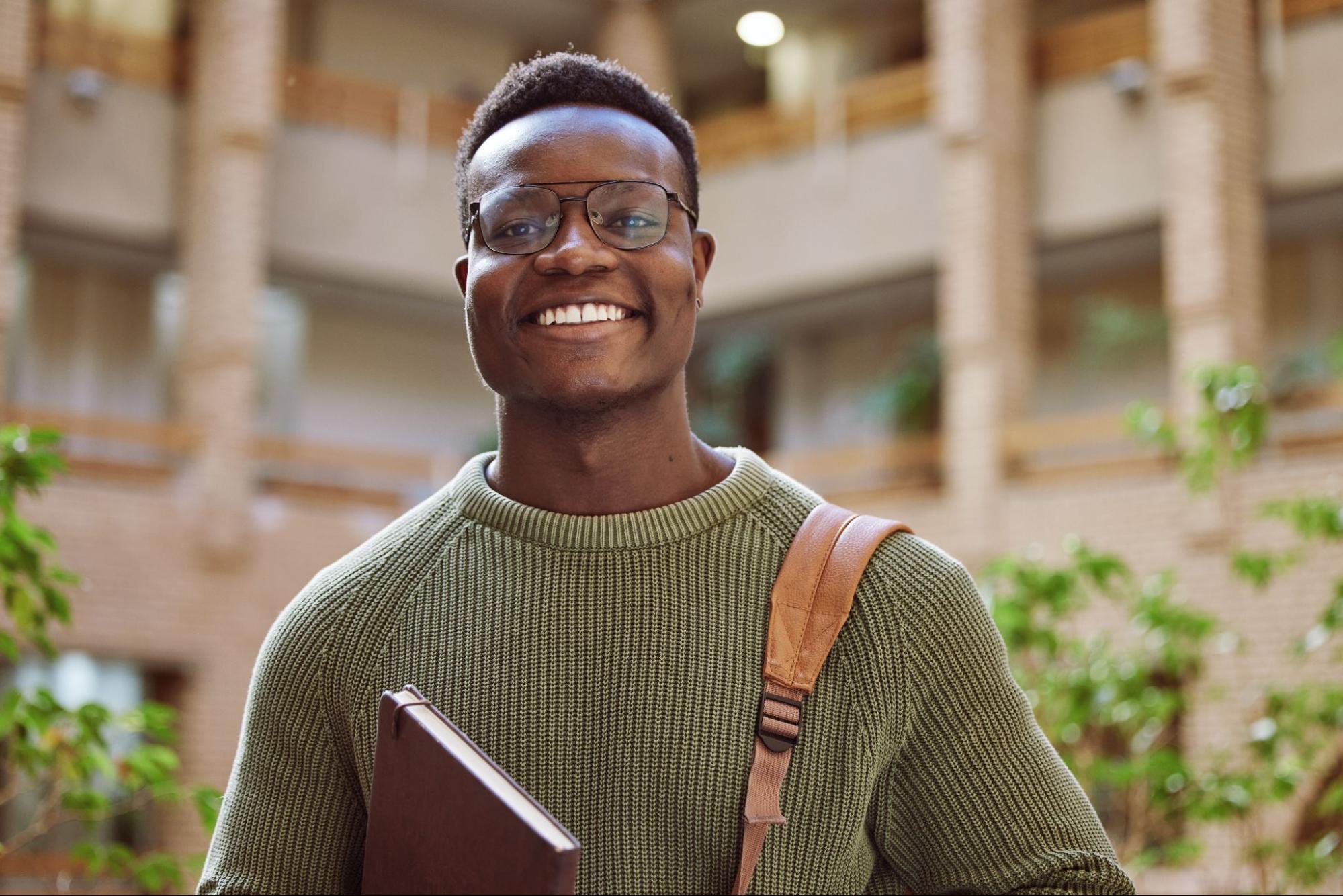 A college student smiling