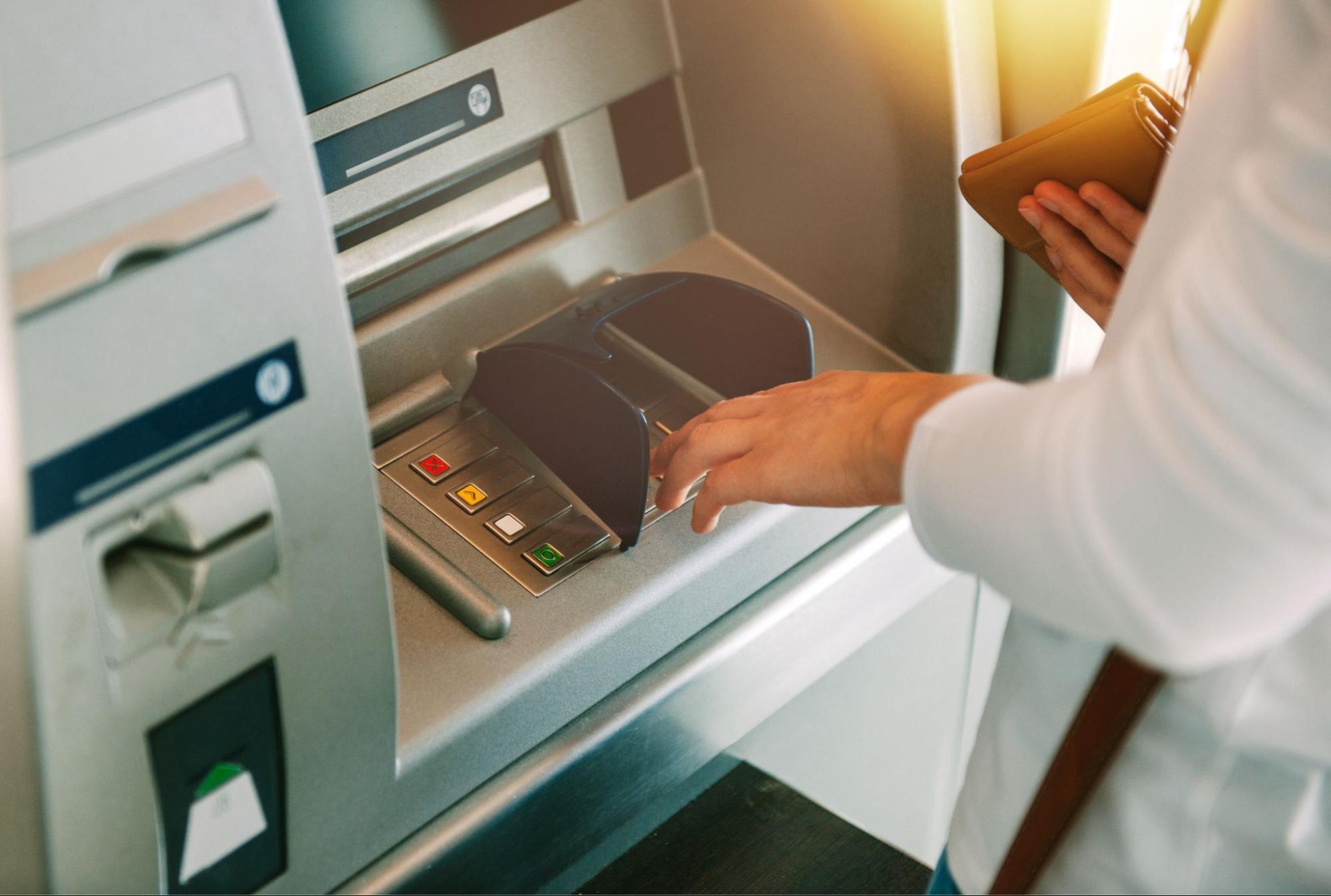 Someone using an ATM
